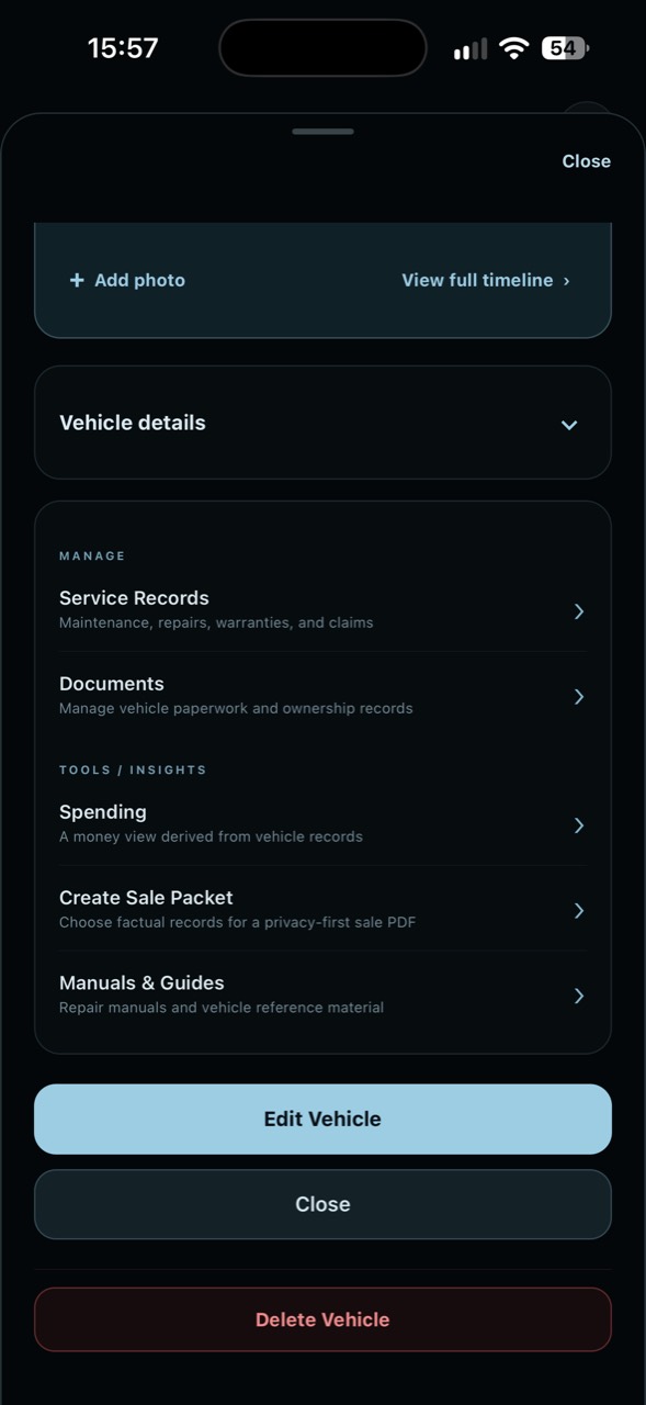 Vehicle management screen with service records, documents, spending, and guides.
